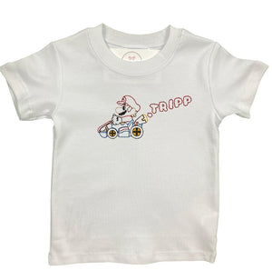White t-shirt with a graphic design of a character in a racing car and text on a white background White t-shirt with a graphic design of a character in a racing car and text on a white background