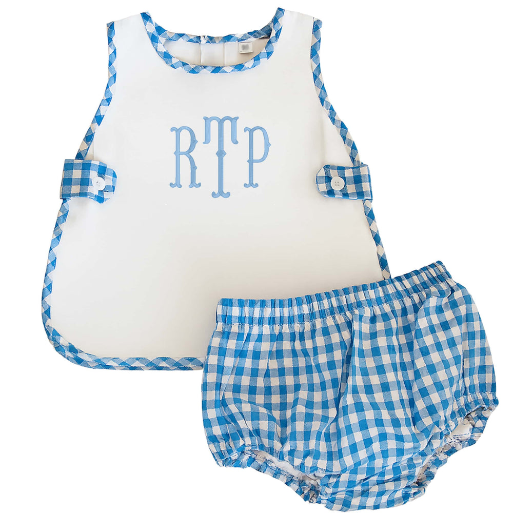 Baby outfit with blue and white checkered top and bloomers on a white background