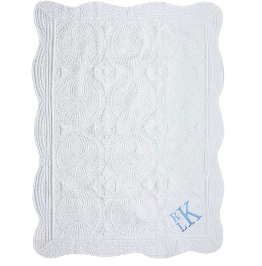 White Quilt with Embroidered Initials