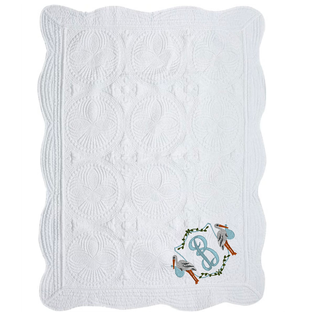 White Quilt with Embroidered Stork Frame and Initials